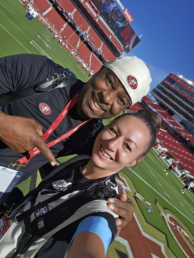 Nikki with the San Francisco 49ers head of photography, Terrell Lloyd.