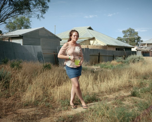 © Adam Ferguson. Isla Hughes,19, a governess at New Year's Day party in New South Wales, 2017.