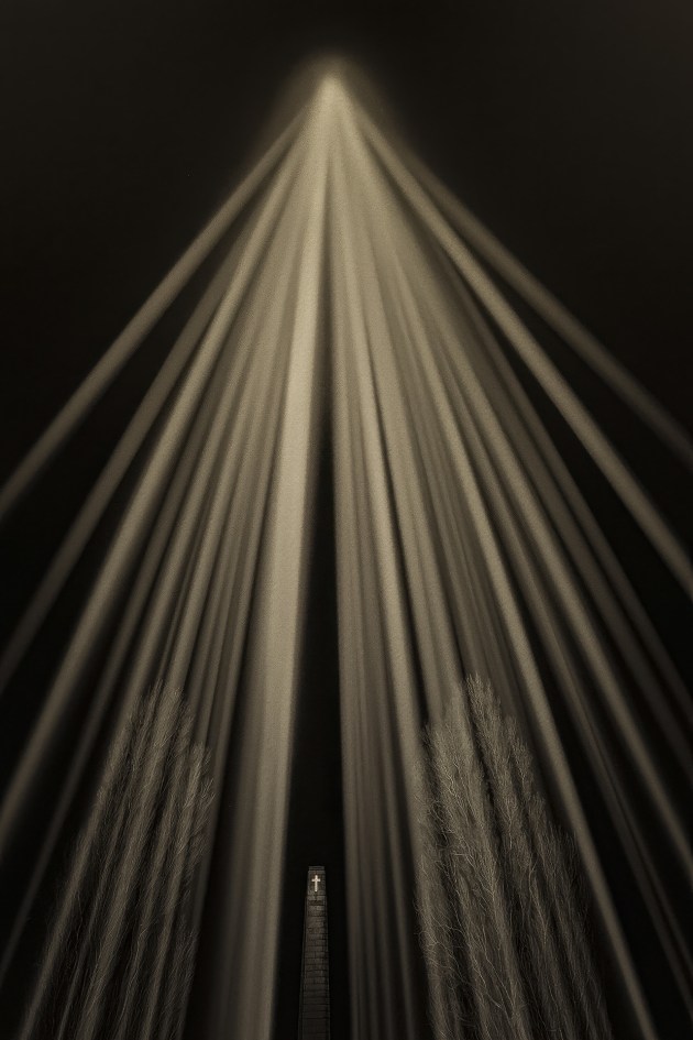 Ascension.This was taken at about 430 am in -3 degrees in Hobart, Tasmania during the infamous Dark Mofo Exhibition. It was so cold my hands actually stuck to the metal on my tripod. I title this image ‘Ascension’ as it speaks to me of the fallen souls that the Cenotaph is honouring heading upwards towards the heavens. Image: Paul Hoelen