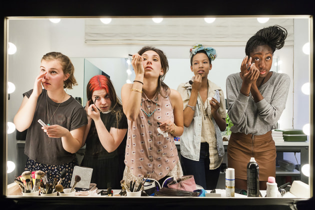 &copy; Lauren Greenfield. High school seniors (from left) Lili, 17, Nicole, 18, Lauren, 18, Luna, 18, and Sam, 17, put on their makeup in front of a two-way mirror for the author&rsquo;s Beauty CULTure documentary, Los Angeles, 2011, from the Generation Wealth series 2011, archival pigment print, 67.9 x 101.6 x 3.3 (image).