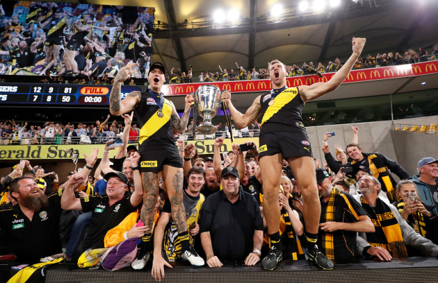 2020 AFL Grand Final - Richmond v Geelong. Dustin Martin of the Tigers (left) and Noah Balta of the Tigers celebrate during the 2020 Toyota AFL Grand Final match between the Richmond Tigers and the Geelong Cats at The Gabba on October 24, 2020 in Brisbane, Australia.