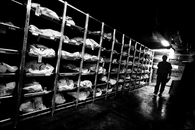 © Platon. Remains of migrants found near the US/Mexico border are inspected and stored at the Pima County Office of the Medical Examiner, Tucson, Arizona. 30 July, 2013.