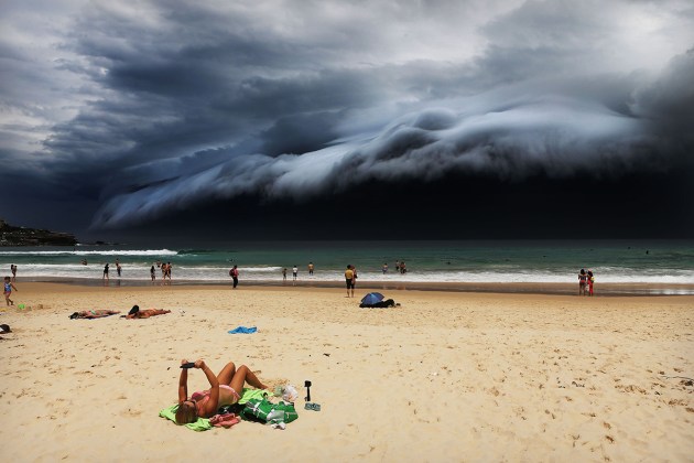 Rohan Kelly, The Daily Telegraph. A massive shelf cloud moves towards Bondi Beach, Australia, on 6 November 2015. The cloud was part of a weather front that brought violent thunderstorms, with local media reporting damaging winds, hailstones the size of golf balls, and heavy rainfall. Shelf clouds are low cloud banks often with smooth or layered surfaces, and black, turbulent bases.