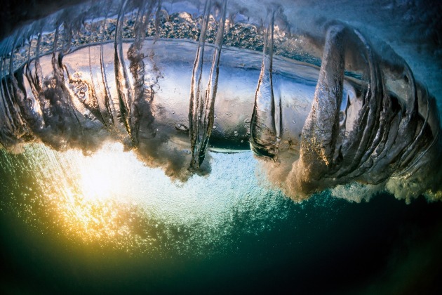© Warren Keelan. Silver Helix. “When a hollow wave breaks over shallow reef or sand, the proceeding impact can be huge. Air trapped within the wave rolls forward and for a split second, a line of rings form below the surface. To capture this image, I had to dive directly into and under the explosion.” North Beach, Wollongong, New South Wales.