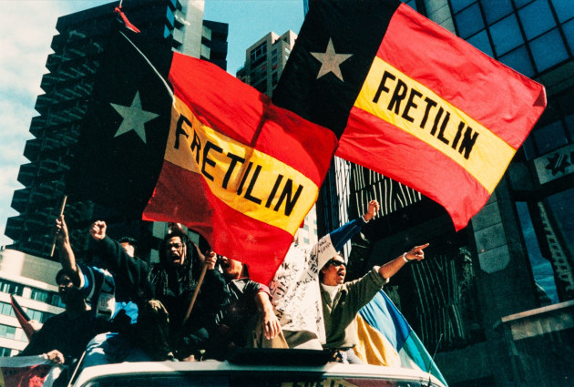 Sydney City, 1998.
Fretilin, East Timor independence protesters and supporters rally in Sydney.
Thousands of protesters marched to then Prime Minister John Howard’s office in the city, placing pressure on the Australian Government, who ultimately sent troops into East Timor. After decades of human rights abuses, Indonesia withdrew from East Timor. Image: Glenn Lockitch.
