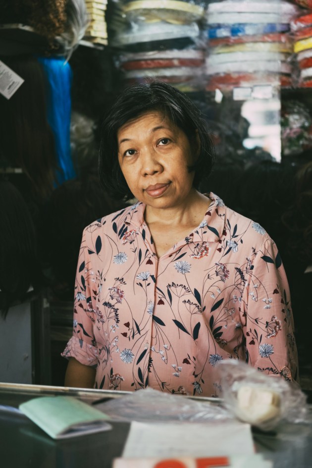 Calm eyes in the eye of the storm. Struck by this serene face right in the middle of the busiest market in Saigon. Arresting and open. Image: Francesca Donnoli